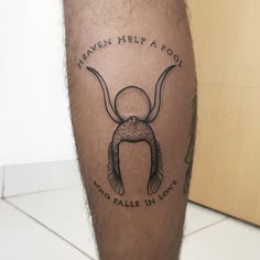 a man's leg with a tattoo on it that says heaven help a fool who falls in love