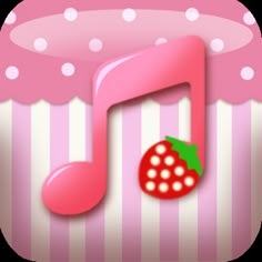 a pink and white cupcake with a music note on it's side, in the shape of a strawberry