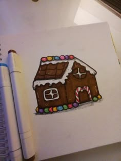 a drawing of a gingerbread house with candy on it