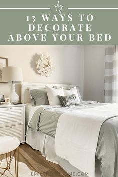 a bed with white sheets and pillows in a bedroom next to a dresser, chair and lamp