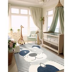 a baby's room with a giraffe rug on the floor