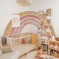 a child's room with a baby crib and bookshelves