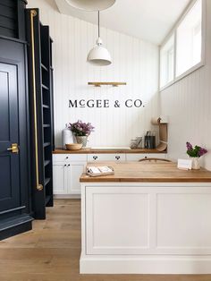 the kitchen is clean and ready to be used as a dining room or office space