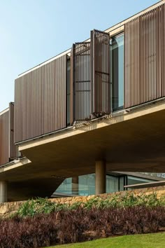 the cover of wall panel design magazine features an image of a building with wooden slats on it