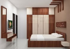 a bedroom with white and brown walls, wooden furniture and a flat screen tv on the wall