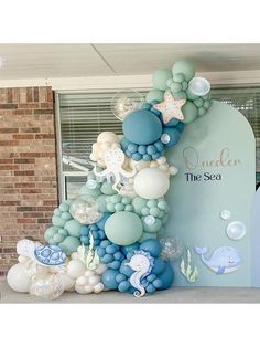 an under the sea themed balloon arch