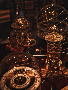 an assortment of metal objects sitting on top of a table