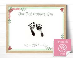 a baby's hand and foot print with the words our first mother's day