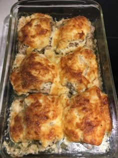 a casserole dish filled with meat and cheese