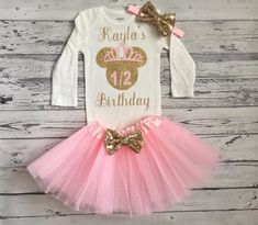 a pink and gold minnie mouse birthday outfit