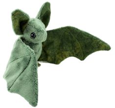 a green stuffed animal with a leaf on it's back and wings spread out