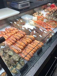 a display case filled with lots of different types of food