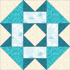 a blue and white quilted block with an intricate design on the center, in two rows