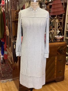 This black and white vertically striped dress is by Adele Simpson.  Rhinestone buttons grace the front of the dress and the cuffs.  The dress is lined, but not the sleeves.  18" back zipper.   SHoulder to shoulder 14" Bust 36" Waist 32" Hips 40" Length 42" total; 32" to the horizontally striped panel Sleeves 17" under arm; 24" along the top Adele Simpson, Lame Fabric, Beetlejuice, Dress Clothes For Women, Striped Dress, Shoulder To Shoulder, The Dress, Dress Outfits, The Top