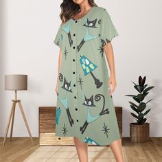 Get ready to unleash your inner feline fashionista with this Mid Mod Muumuu House Dress! Adorned with quirky, kitschy atomic cats, this dress adds a touch of playfulness and humor to your wardrobe. Stay stylish and comfortable in this unique and fun dress. Type: 95% Polyester and 5% Spandex, for Women, All Over Printing 12.52 Oz. Made of high-quality fabric, smooth and comfortable. Featured Round neck, short sleeves, loose cut that leaves more room for you, look great on any body type. Button cl Retro Shower Curtain, Atomic Cat, Mid Century Modern Christmas, Valentines Pillows, Muumuu Dress, Cozy Loungewear, Fun Dress, Vintage Tv, Mid Mod