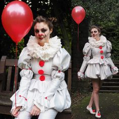 a woman dressed in white and red with balloons