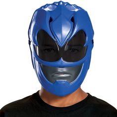 a man wearing a blue mask with black eyes