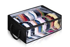 an open suitcase filled with lots of clothes on top of a white surface and black handles