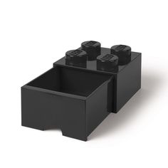 a black lego storage box with four small legos in the bottom section and two smaller ones on each side