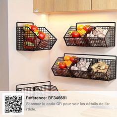 three metal baskets with fruits and vegetables on them hanging from the wall above a computer desk