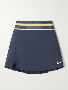 Nike's 'Slam' tennis skirt is designed with considered details to help boost your performance on the court. Cut from moisture-wicking Dri-FIT, it has a mesh waistband for ventilation and internal shorts that provide comfort and coverage. Sporty Fitted Navy Skort, Navy Fitted Sporty Skort, Fitted Navy Skort For Sports, Navy Fitted Tennis Skirt With Lining, Navy Fitted Tennis Skirt With Lined Skirt, Navy Sporty Skort For Sports, Athleisure Tennis Skirt With Lining, Athleisure Tennis Skirt With Lined Skirt, Blue Stretch Tennis Skirt