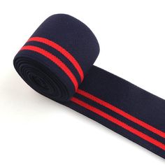 a blue and red striped tie on a white background