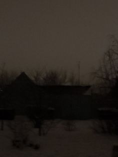 the sky is very dark and overcast at night