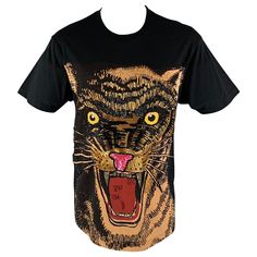 GUCCI F/W 2019 oversized t-shirt comes in a black jersey cotton knit material featuring a feline print with bead and sequin embroidery design at front and a crew-neck. Made in Italy.New with Tags. Marked: XXS Measurements: Shoulder: 21.5 inches Chest: 43 inches Sleeve: 8.5 inches Length: 31 inches Reference: 124905 Category: T-shirt More Details Brand: GUCCI Size: XXS Gender: Male Color: Black Color 2: Gold Pattern: Embroidery Fabric: Cotton Style: Crew-Neck Condition: 1. New wtih Tags Age Group: Adult Embroidery Cotton, Sequin Embroidery, Gold Embroidery, Embroidery Fabric, Sequins Embroidery, Gold Pattern, Designer Style, Oversized T Shirt, Wild Animals