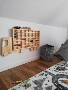 a child's bedroom with a teepee tent and toys