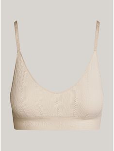 Tommy Hilfiger women's underwear. An intricate knit pattern defines this triangle bra, made from soft, stretch fabric and featuring a logo elastic waistband.  Material: 79% Recycled Nylon ,  Polyamide, 15% Polyamide. Knitted Bra, Logo Knit, Triangle Bra, Tommy Hilfiger Women, Knit Pattern, A Logo, Knit Patterns, Stretch Fabric, Tommy Hilfiger