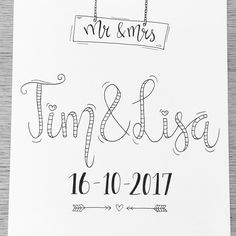 a wedding sign hanging from a rope with the words mr and mrs written on it