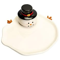 a white tray with a black lid and a snowman on it