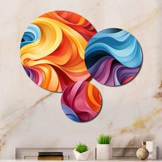 multicolored abstract artwork on the wall in a living room