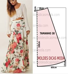 a woman is wearing a long skirt with flowers on it and the measurements are shown