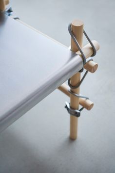 a close up of a wooden toy on a table