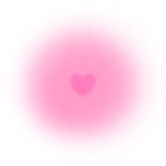 a blurry image of a heart in the middle of a pink circle on a white background