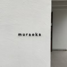 there is a sign that says muracka on the wall