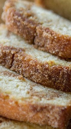 two pieces of bread stacked on top of each other with sugar sprinkles