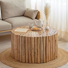 a coffee table made out of wood sticks