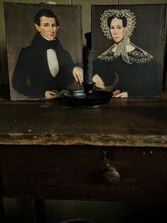 two paintings of people sitting next to each other on top of a wooden table in front of a wall