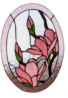 a stained glass window with pink flowers in the center and green leaves on each side