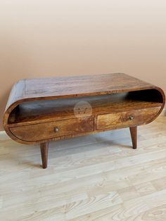 a wooden table with two drawers on one side and an open drawer on the other