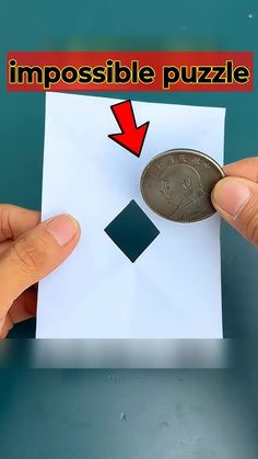 two hands holding up a piece of paper with a penny on it and the word impossible puzzle above it