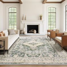 a living room with couches, chairs and a rug in front of a fireplace