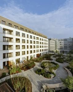 an aerial view of a large building with many windows