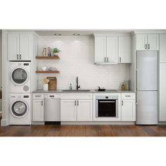 a kitchen with white cabinets, appliances and wood floors is shown in this image from the front view