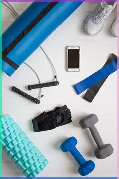 an assortment of exercise equipment laid out on a table