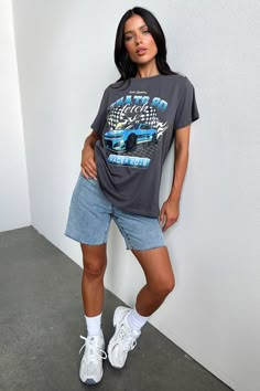 Slip into comfort with our Homestretch Oversized Tee! Featuring an exclusive TSF graphic and oversized fit, this tee is perfect for lounging or dressing up. With a crew neckline and streetwear vibes, pair her with a denim mini skirt and some chunky sneakers for a chic everyday look! FABRICATION: 85% Cotton / 15% Polyester SIZING: Crystal's height is 162cm/5'3 and wears a size AU 6 / US 2. Jorts And Oversized Tshirt, Oversized Tshirt Shorts, T Shirt Fashion Outfit, Baggy T Shirts, Oversized Shorts Outfit Women, Big Graphic Tee Outfit, Graphic Tshirt Outfits, Grey Graphic Tee, How To Style An Oversized Tee