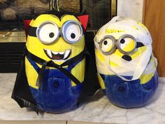 two yellow and blue despicables sitting next to each other on a counter