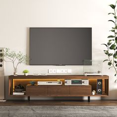 a flat screen tv mounted to the side of a wooden entertainment center in a living room